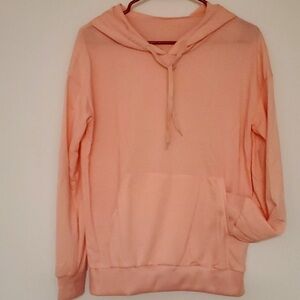 Peachy Coral Hoodie Heart Graphic on sSeeves Size M/L NWOT Kangaroo Pocket